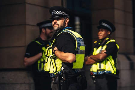 Dressing as a police officer or any member of armed forces