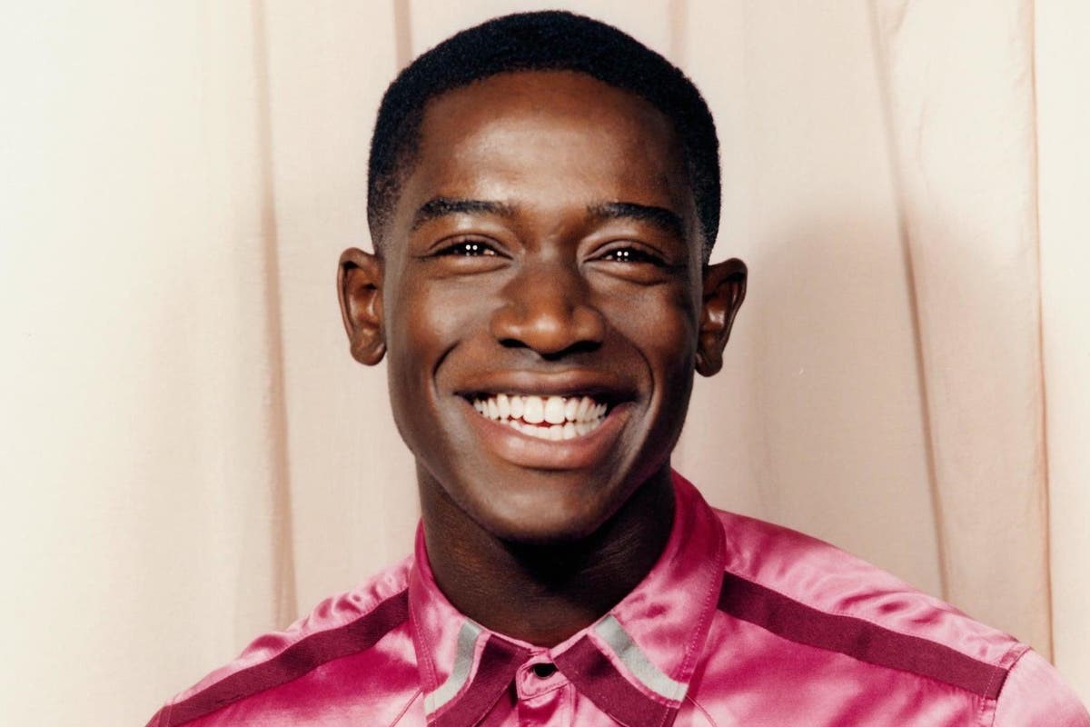 Damson Idris smiling